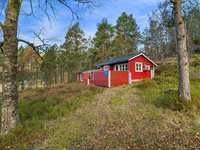 EiendomsMegler1 v/Torill Kalsaas presents cabin with outdoor room at Giljastølen