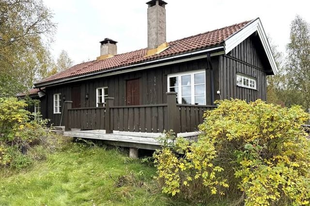 Exterior view of the main cottage and garden